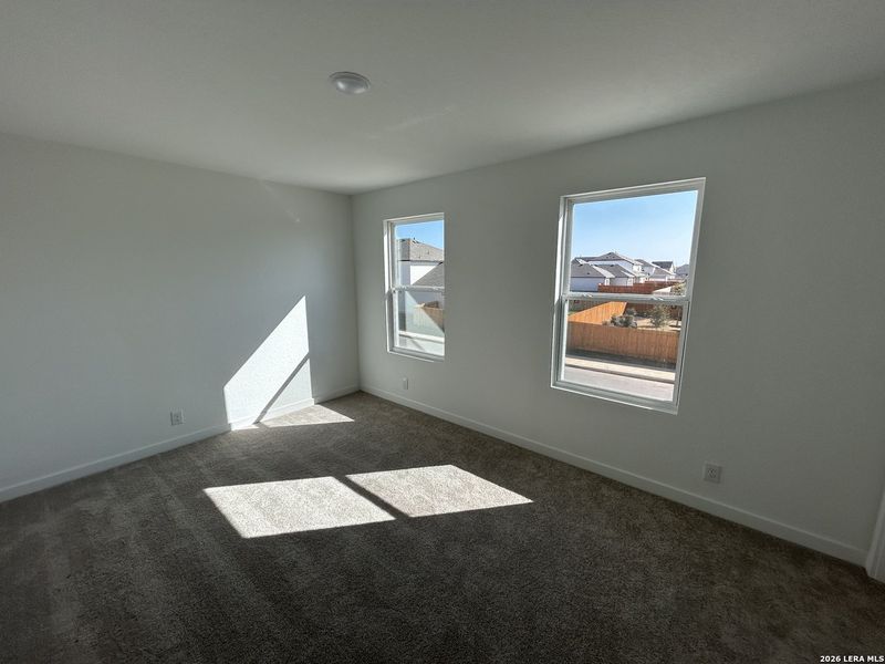 Spacious, unfurnished interior of a new home in Hennersby Hollow, San Antonio (Image 28).