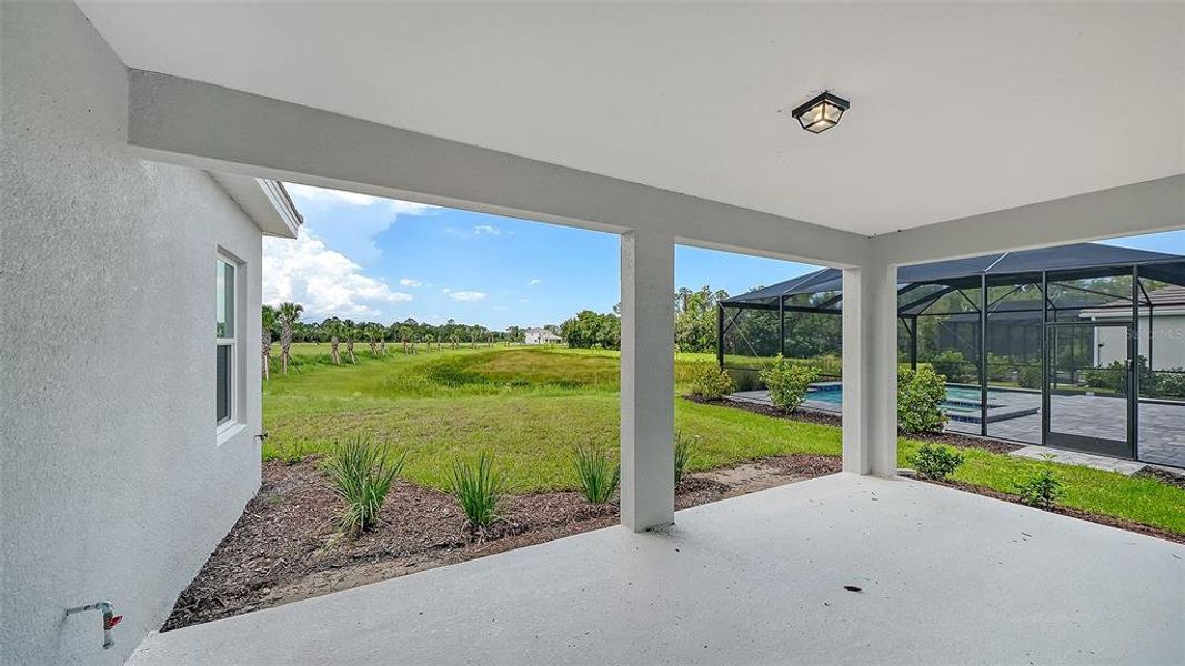 Exterior details and patio area of a home in Grand Park, Sarasota (Image 23). Exterior details and patio area of a home in Grand Park, Sarasota (Image 23).