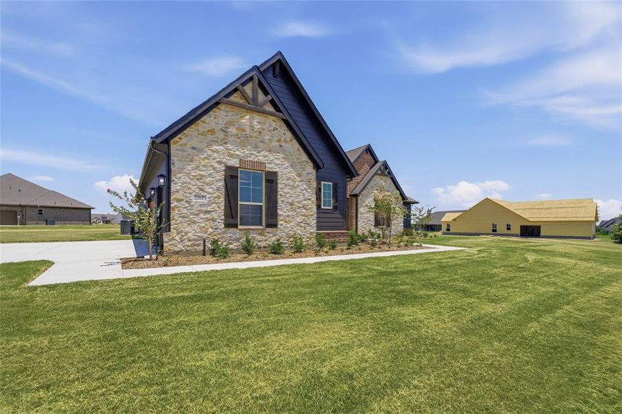 Front exterior of a new home in Rocky Top, Krum, TX, highlighting curb appeal (Image 18). Front exterior of a new home in Rocky Top, Krum, TX, highlighting curb appeal (Image 18).
