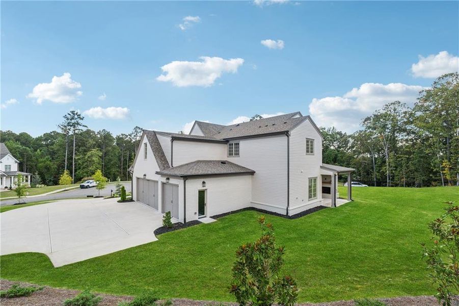 Front exterior of a new home in , Acworth, GA, highlighting curb appeal (Image 25). Front exterior of a new home in , Acworth, GA, highlighting curb appeal (Image 25).