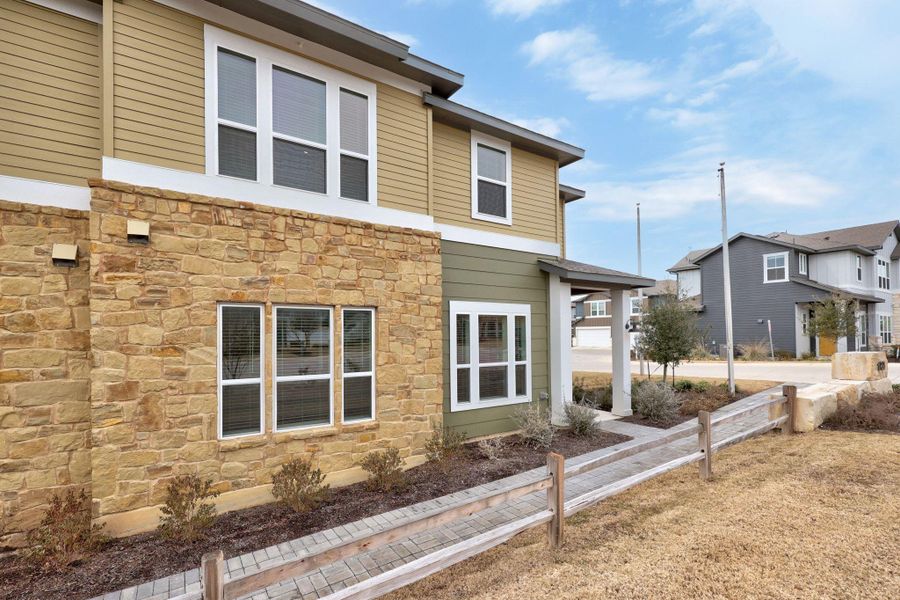View of home's exterior with stone siding
