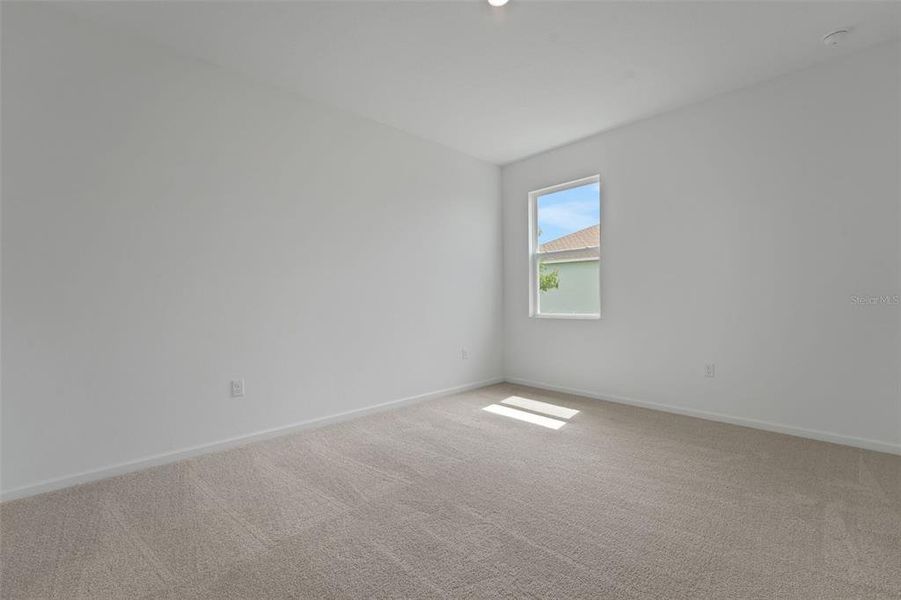 Spacious, unfurnished interior of a new home in Annabelle Estates, Winter Haven (Image 24).