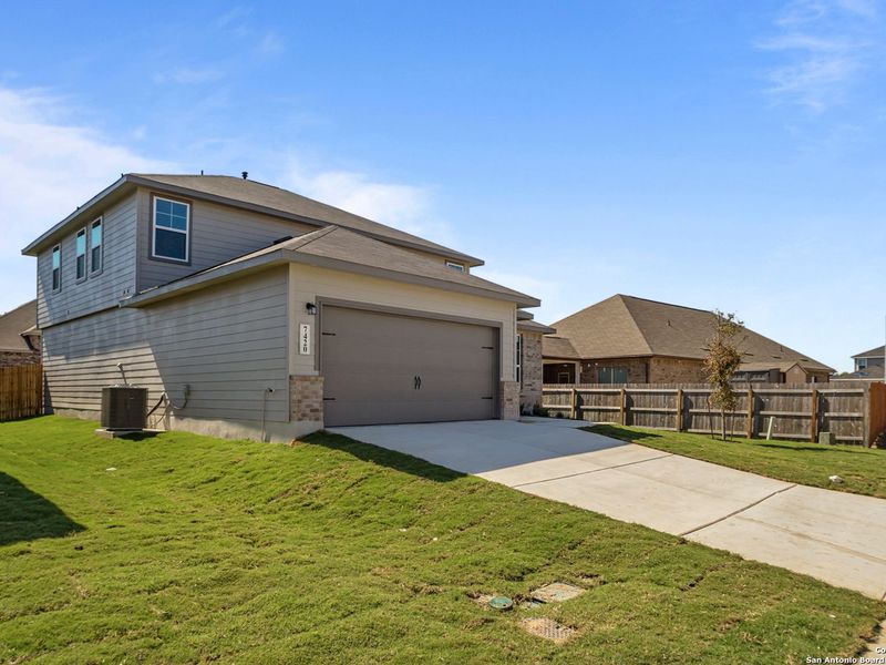 Exterior details and patio area of a home in Horizon Pointe, San Antonio (Image 2). Exterior details and patio area of a home in Horizon Pointe, San Antonio (Image 2).