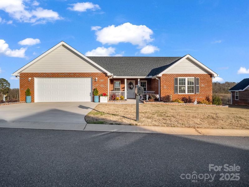 Front exterior of a new home in , Spindale, NC, highlighting curb appeal (Image 22). Front exterior of a new home in , Spindale, NC, highlighting curb appeal (Image 22).