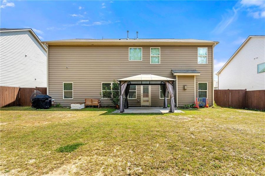 Front exterior of a new home in , Loganville, GA, highlighting curb appeal (Image 2).