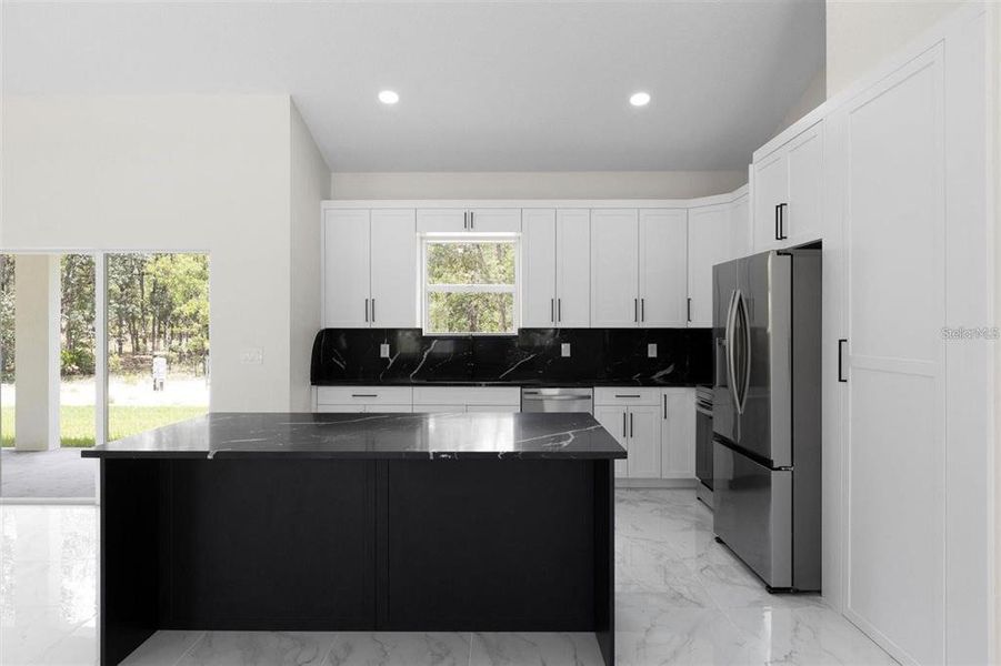 Furnished interior view inside a new home in , Dunnellon (Image 12).