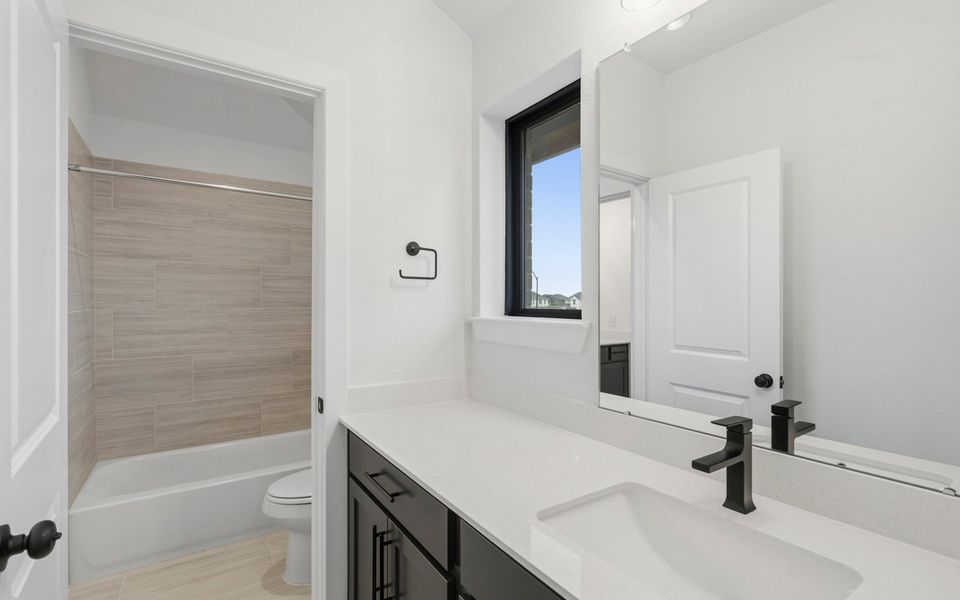 Furnished interior view inside a new home in Elyson, Katy (Image 6).