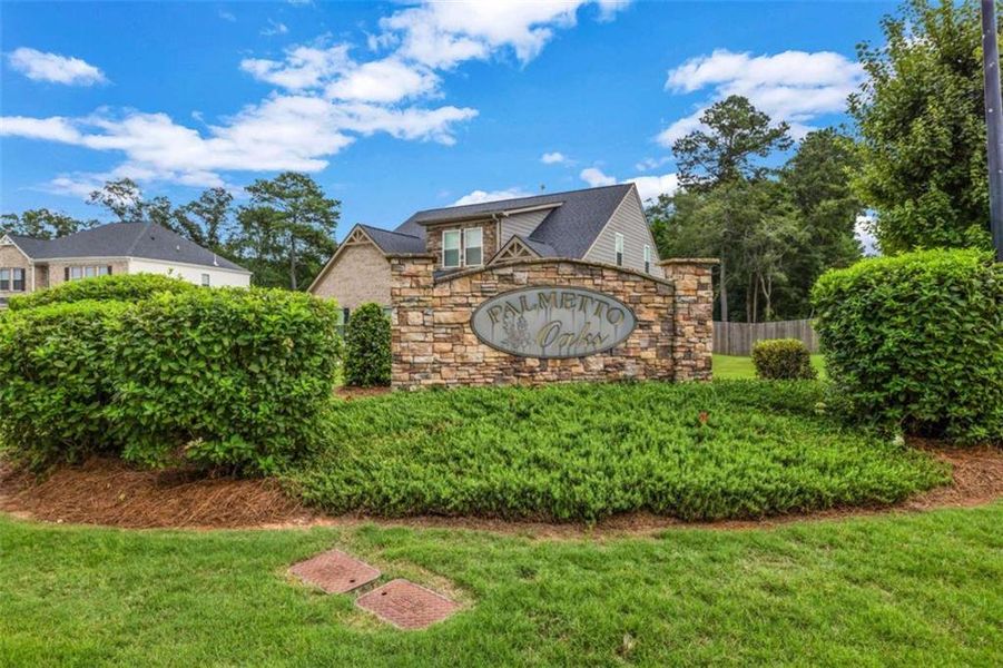 Front exterior of a new home in Palmetto Oaks Phase III, Palmetto, GA, highlighting curb appeal (Image 20). Front exterior of a new home in Palmetto Oaks Phase III, Palmetto, GA, highlighting curb appeal (Image 20).