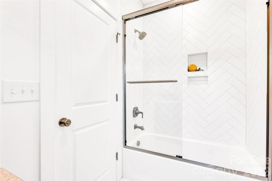 Separate room with tub/shower