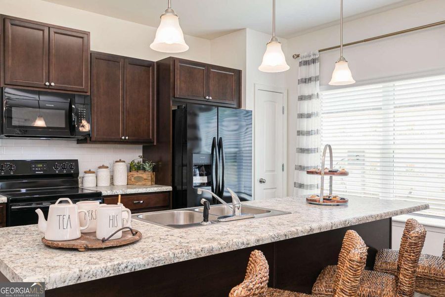 Furnished interior view inside a new home in Maddox Station, Eatonton (Image 11).