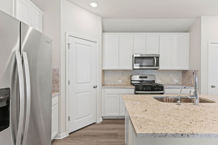 Furnished interior view inside a new home in Flora, Hutto (Image 8). Furnished interior view inside a new home in Flora, Hutto (Image 8).