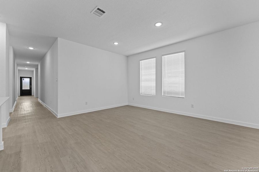 Spacious, unfurnished interior of a new home in Waterwheel: Coastline Collection, San Antonio (Image 13).