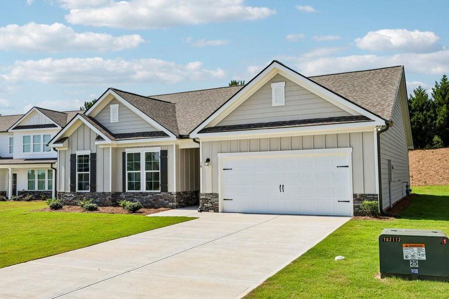 Front exterior of a new home in Sutton’s Landing, Statham, GA, highlighting curb appeal (Image 20).