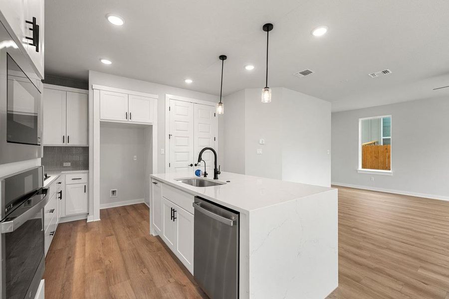 Furnished interior view inside a new home in Heritage, Dripping Springs (Image 7).