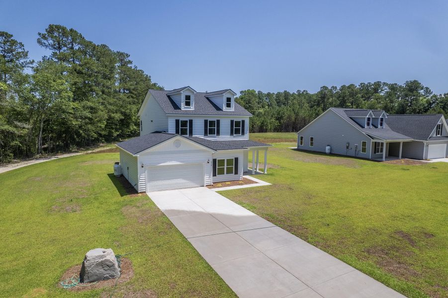 Front exterior of a new home in , Dorchester, SC, highlighting curb appeal (Image 28).