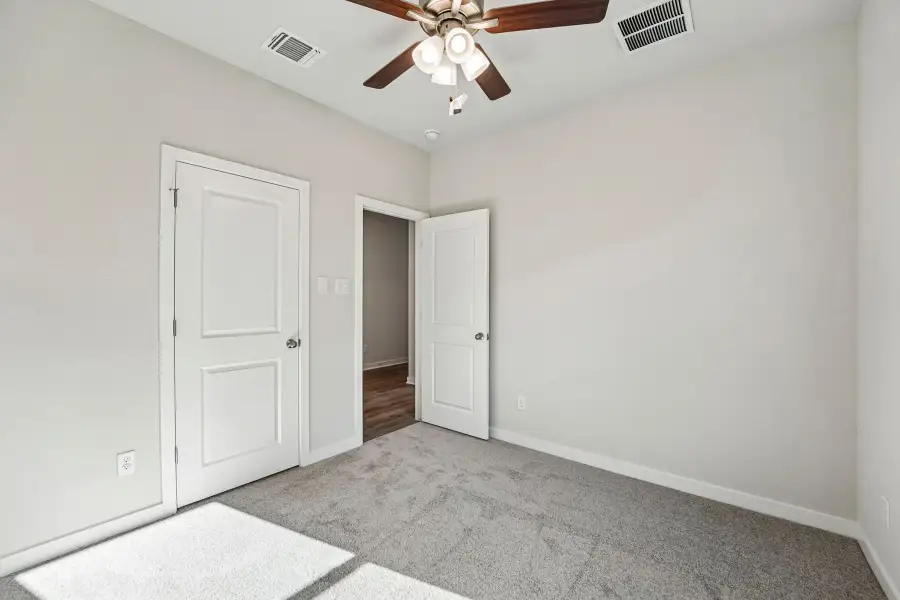 Spacious, unfurnished interior of a new home in Hillside Village, Temple (Image 12). Spacious, unfurnished interior of a new home in Hillside Village, Temple (Image 12).
