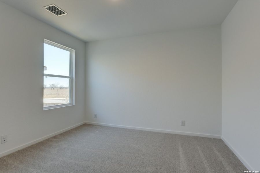 Spacious, unfurnished interior of a new home in Hennersby Hollow, San Antonio (Image 27).