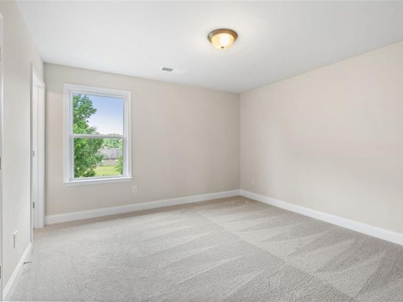 Spacious, unfurnished interior of a new home in Wehunt Meadows, Hoschton (Image 30).