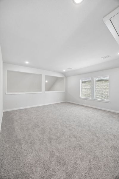 Game Room in the Winters home plan by Trophy Signature Homes – REPRESENTATIVE PHOTO