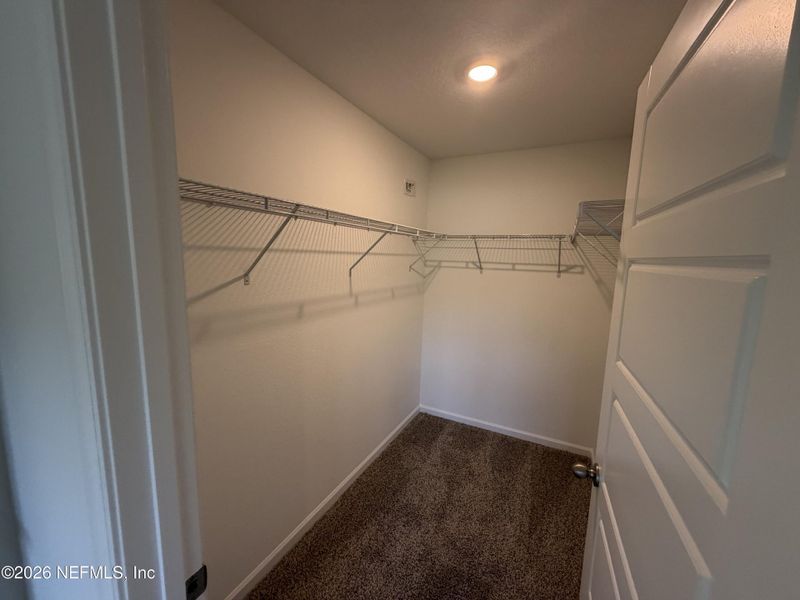 Spacious, unfurnished interior of a new home in Grand Reserve, Bunnell (Image 32).