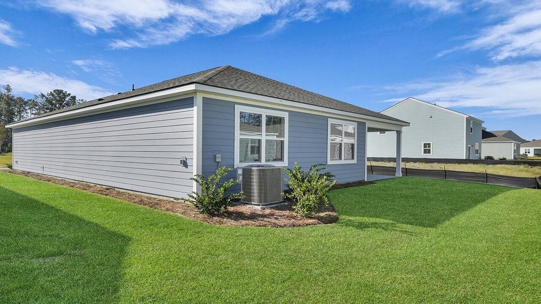 Exterior details and patio area of a home in Hillcrest, Ravenel (Image 19). Exterior details and patio area of a home in Hillcrest, Ravenel (Image 19).