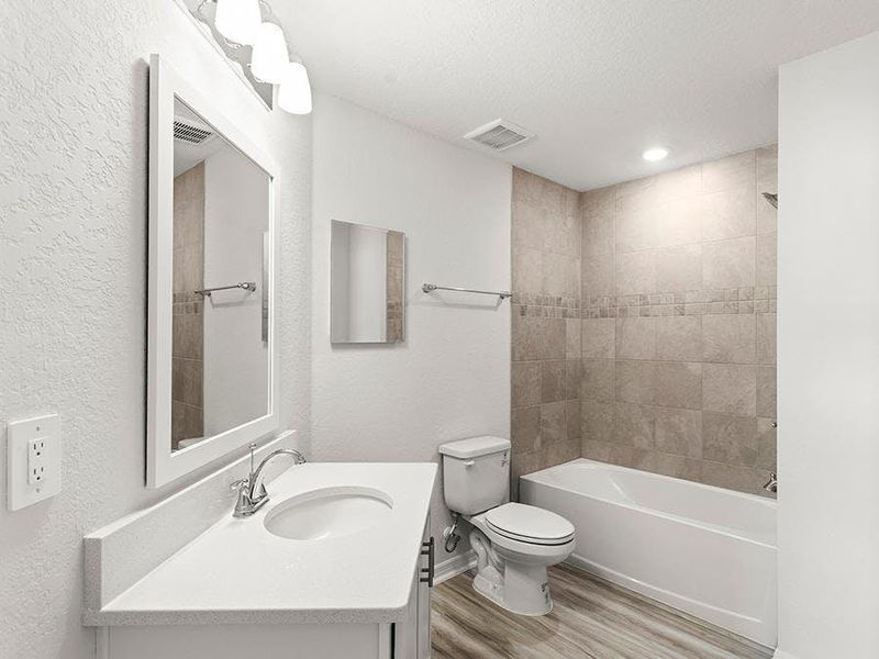 And, an upstairs hall bath serves bedroom 4 and the loft - Danyella bungalow by Highland Homes