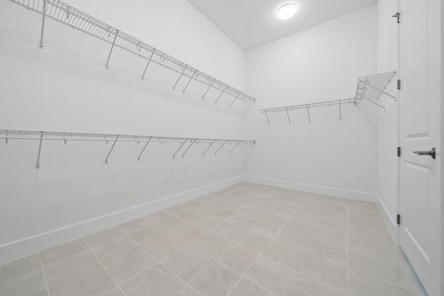 Spacious, unfurnished interior of a new home in L'Ambiance at Avenir, Palm Beach Gardens (Image 39).