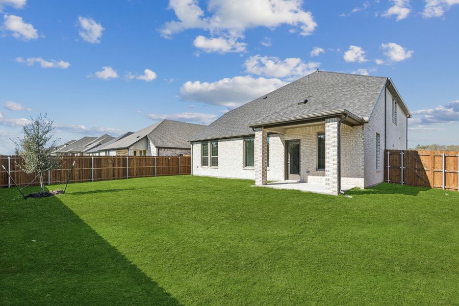Covered Patio in the Winters home plan by Trophy Signature Homes – REPRESENTATIVE PHOTO Covered Patio in the Winters home plan by Trophy Signature Homes – REPRESENTATIVE PHOTO