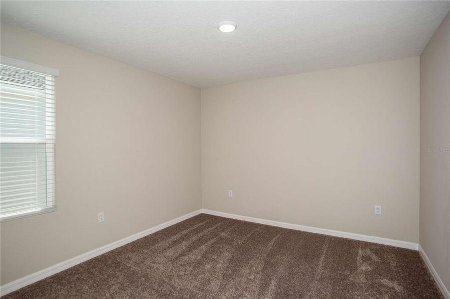 Spacious, unfurnished interior of a new home in Crosswinds, Haines City (Image 23).