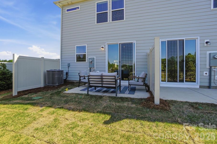 Exterior details and patio area of a home in Arbor Chase, Clover (Image 24).