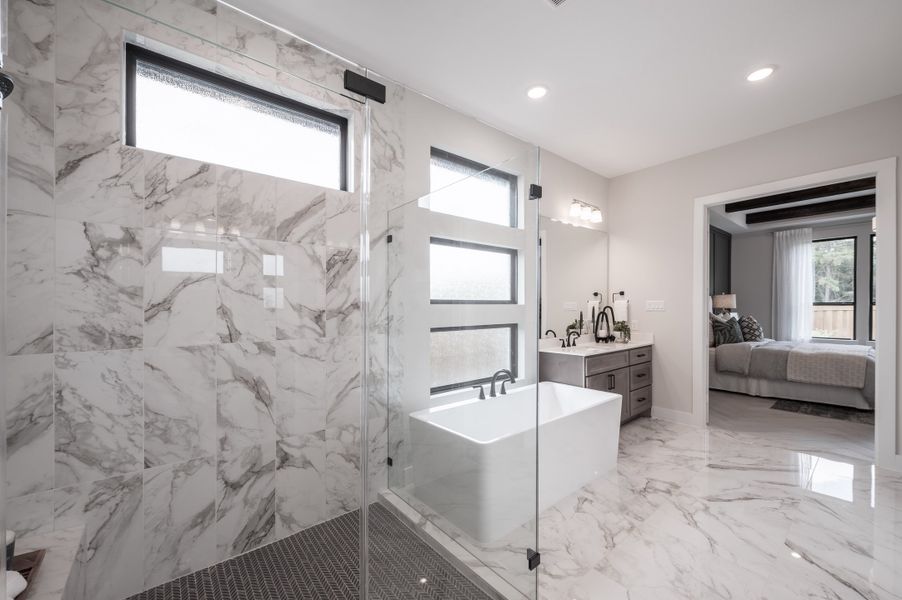 Representative furnished interior of a home built from the Carignan by Tri Pointe Homes in Sienna 80′, Missouri City (Image 35).