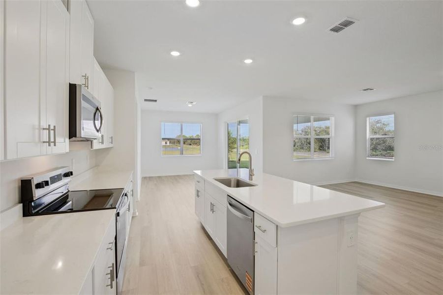 Furnished interior view inside a new home in Coasterra - Reserve Series, Palmetto (Image 10). Furnished interior view inside a new home in Coasterra - Reserve Series, Palmetto (Image 10).