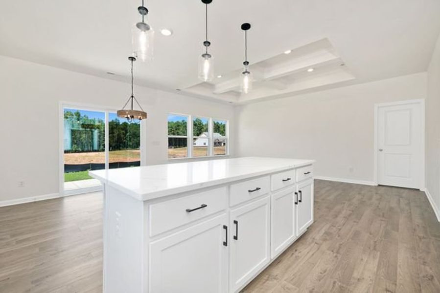 Representative furnished interior of a home built from the Shaw by True Homes in Whispering Hills, Locust (Image 7).