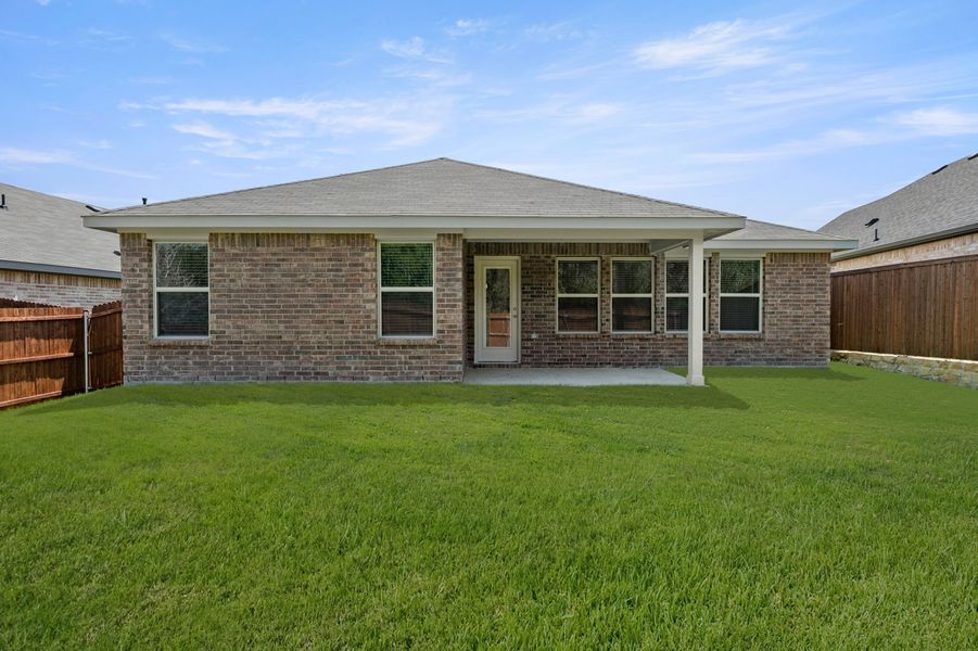 Front exterior of a new home in ValleyBrooke, Mesquite, TX, highlighting curb appeal (Image 26). Front exterior of a new home in ValleyBrooke, Mesquite, TX, highlighting curb appeal (Image 26).