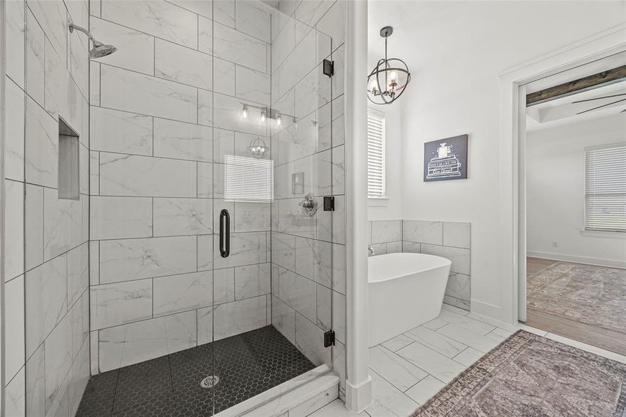 Bathroom with tile patterned flooring and walk in shower