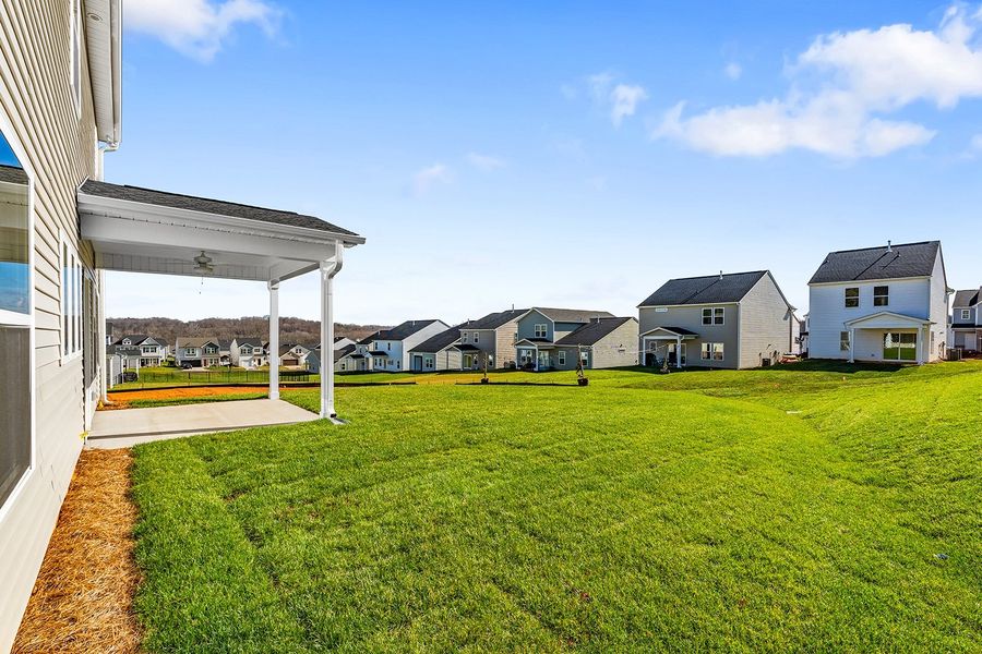 Exterior details and patio area of a home in Hanes Lake, Winston-Salem (Image 4).
