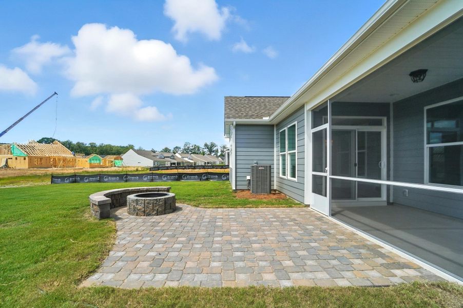 Front exterior of a new home in Heritage - 55+ Community, Indian Trail, NC, highlighting curb appeal (Image 32). Front exterior of a new home in Heritage - 55+ Community, Indian Trail, NC, highlighting curb appeal (Image 32).