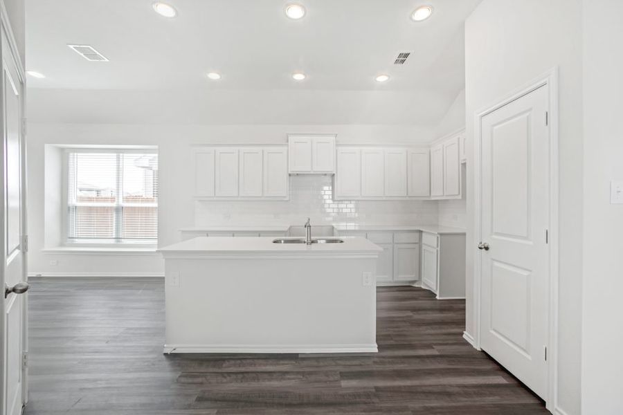 Representative exterior photo of a completed home built from the Bastrop by Impression Homes in Heartland, Heartland, TX (Image 8).