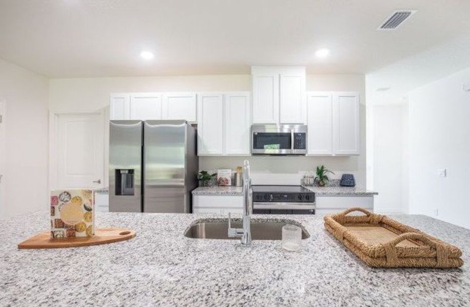 Furnished interior view inside a new home in Coastal Communities, Edgewater (Image 6).