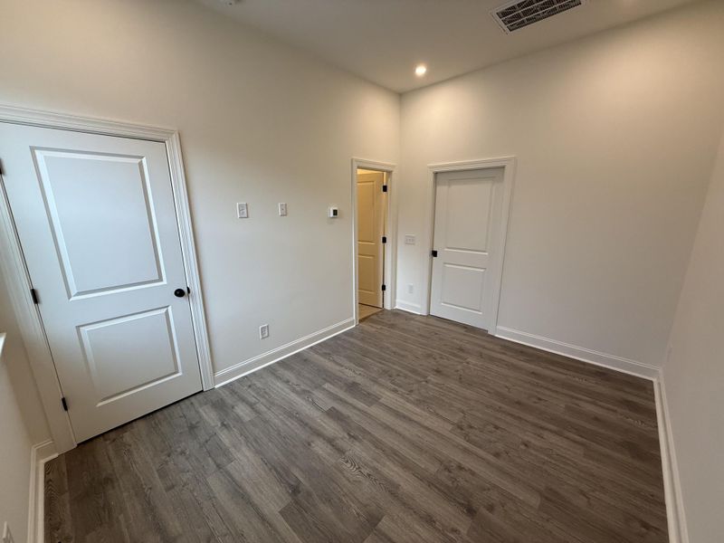 Spacious, unfurnished interior of a new home in The Domus Collection at Midtown Nexton, Summerville (Image 49).