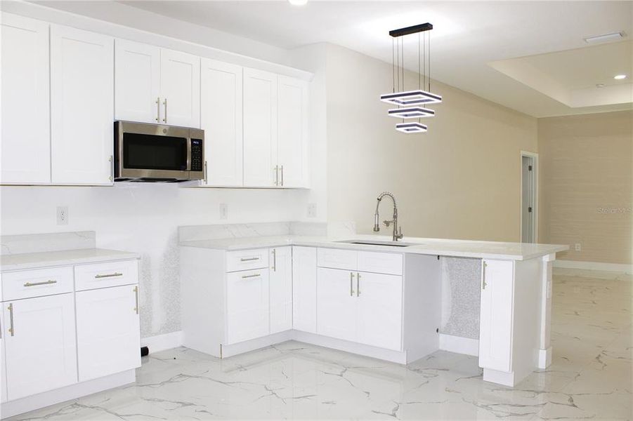 Furnished interior view inside a new home in , Tampa (Image 15).