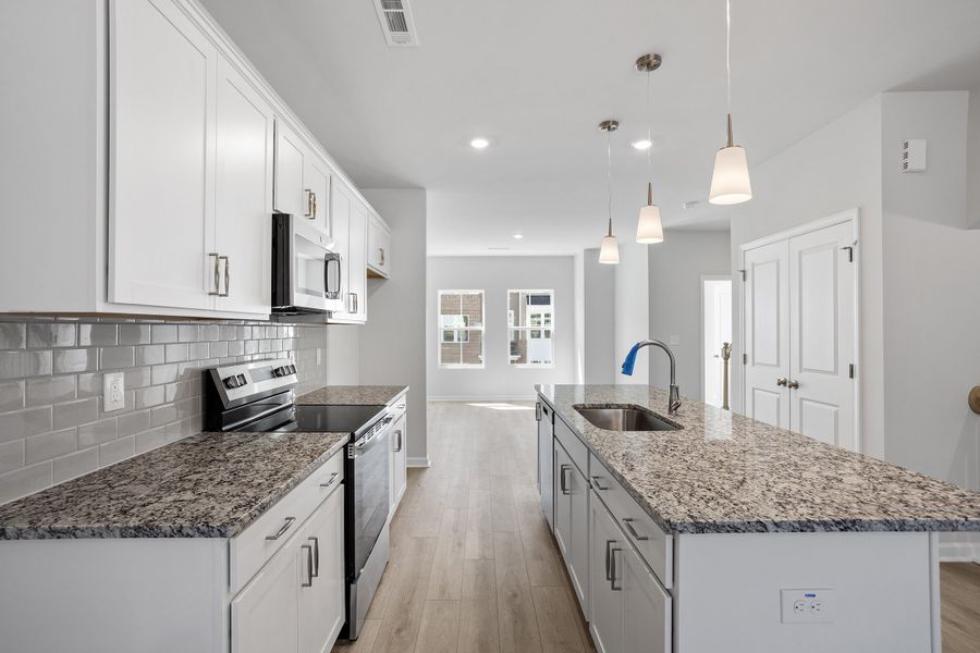 Furnished interior view inside a new home in Renaissance at White Oak, Garner (Image 8). Furnished interior view inside a new home in Renaissance at White Oak, Garner (Image 8).