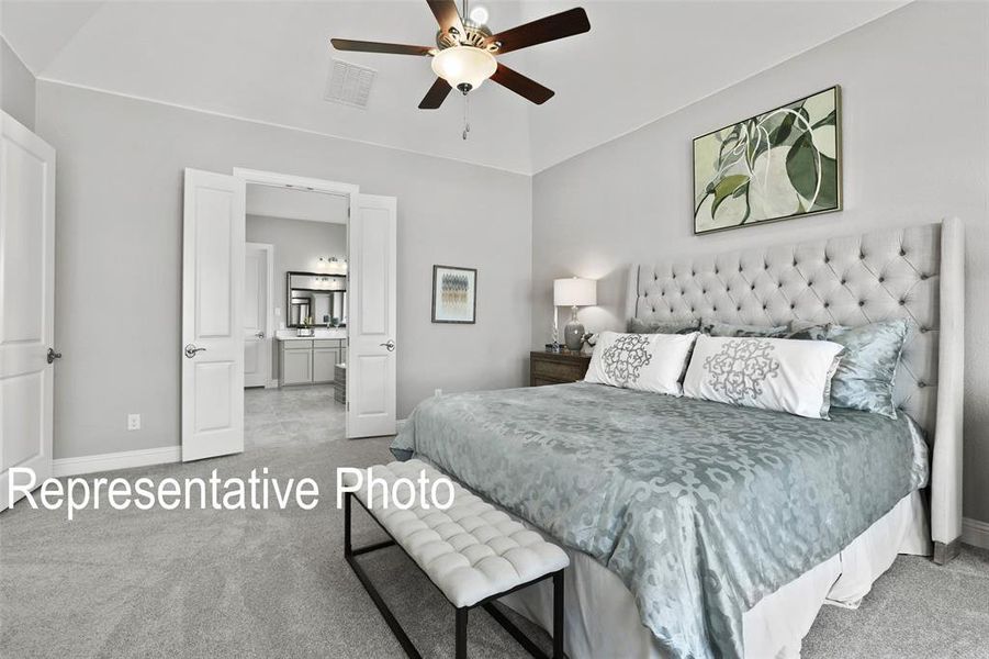 Carpeted room featuring a ceiling fan with light fixture, recessed lighting, and a tray ceiling Carpeted room featuring a ceiling fan with light fixture, recessed lighting, and a tray ceiling