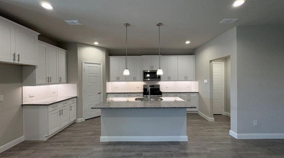 Furnished interior view inside a new home in Sandstone Estates, Granbury (Image 5). Furnished interior view inside a new home in Sandstone Estates, Granbury (Image 5).