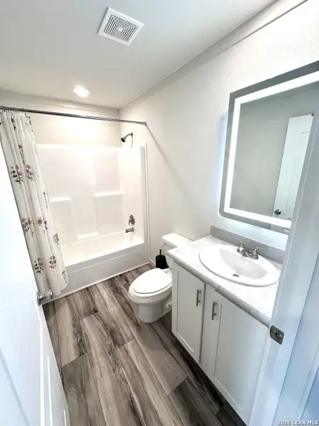 Furnished interior view inside a new home in , Lakehills (Image 5).