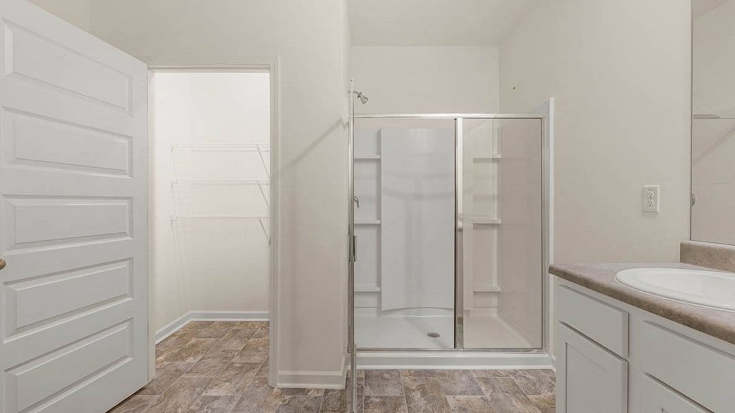 Representative furnished interior of a home built from the Dennis by D.R. Horton in Glenmaye, Hampton (Image 11).