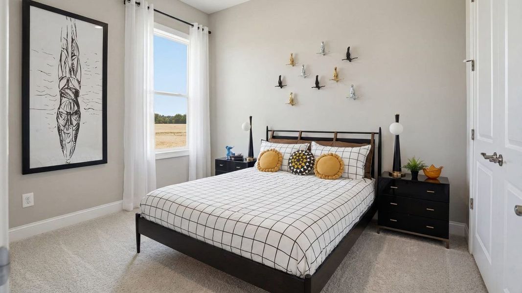 Furnished interior view inside a new home in Cresswind at Rocky River, Locust (Image 13).