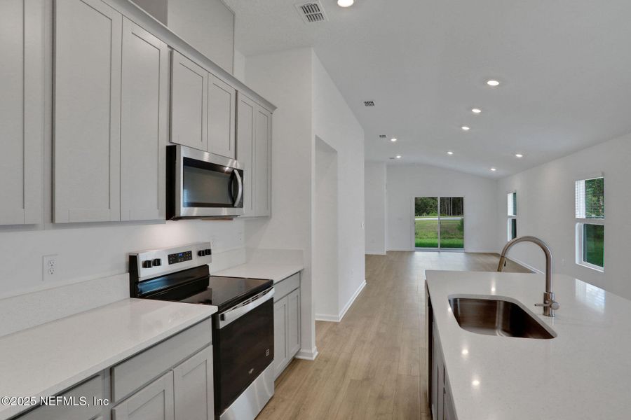 Furnished interior view inside a new home in Amberly, Green Cove Springs (Image 16).