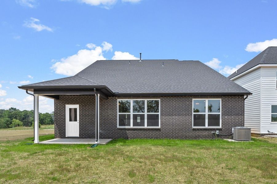 Exterior details and patio area of a home in Woods Crossing, Gallatin (Image 31).