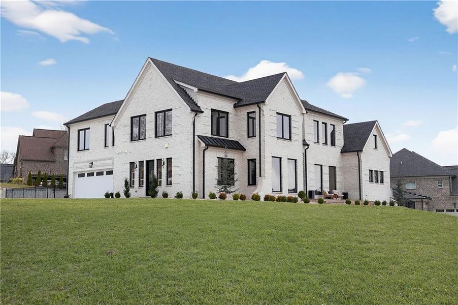 Front exterior of a new home in , Hoschton, GA, highlighting curb appeal (Image 28).